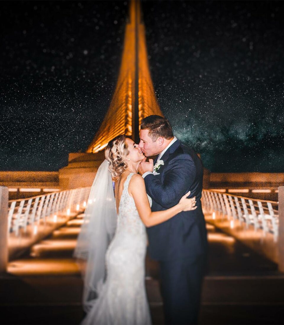 happy couple at night coast weddings