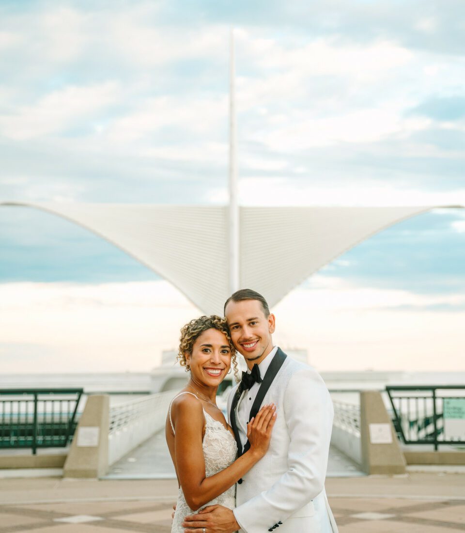 Bride and groom at Milwaukee boardwalk