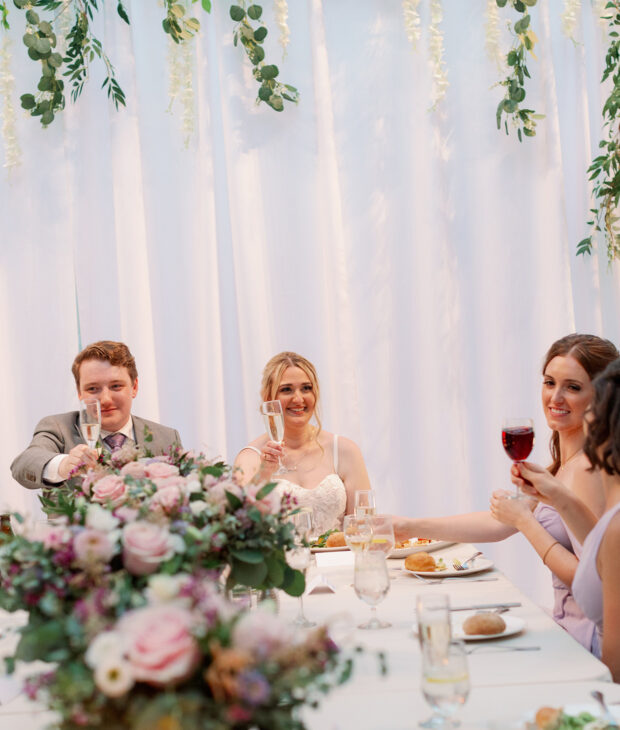 newlywed couple toast their guests, boerner botanical gardens