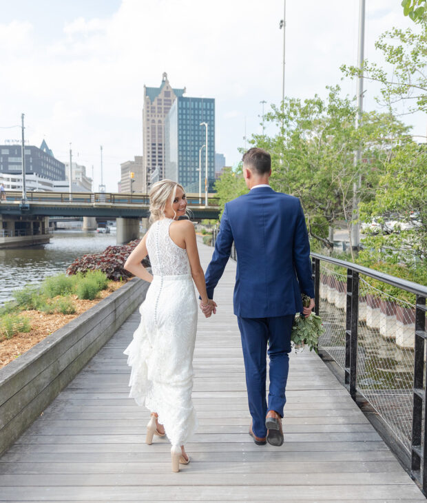 miller room weddings couple taking lakeside walk