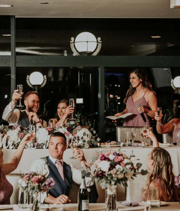 miller room weddings top table toasting happy couple