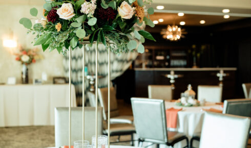 miller room interior featuring set tables and centerpieces