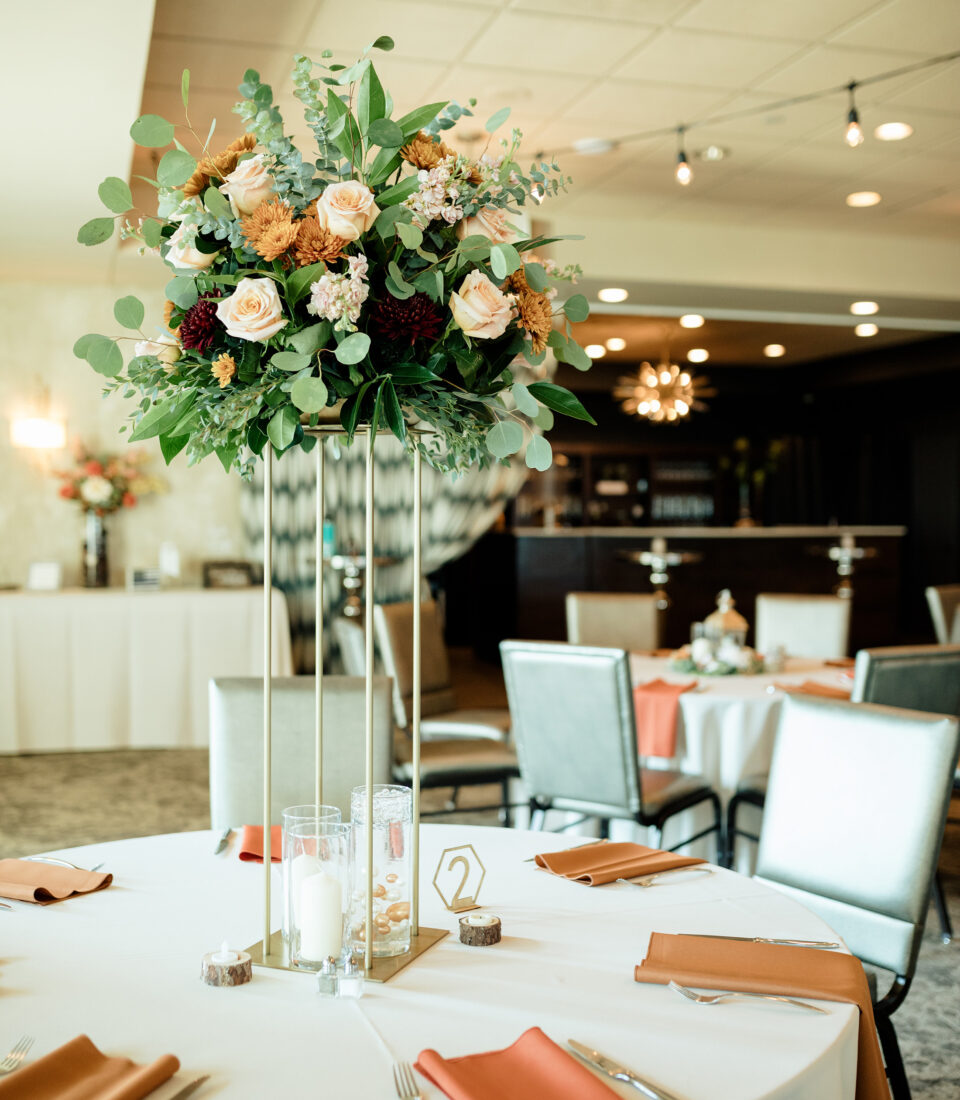 miller room interior featuring set tables and centerpieces