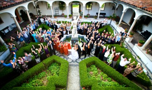 villa terrace courtyard & fountain with wedding guests.