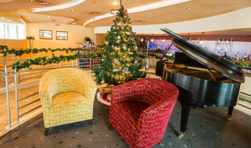 Piano and two chairs at Coast.