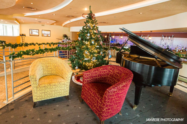 Piano and two chairs at Coast.