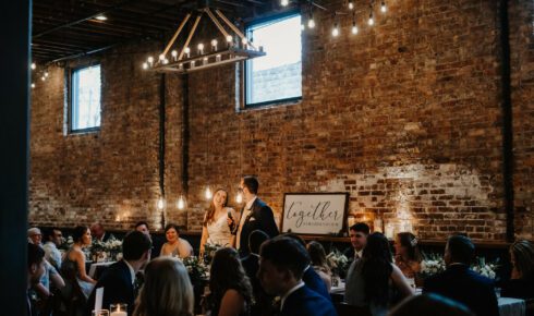 Head table at Mercantile Hall Milwaukee wedding venue