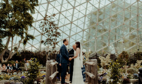 Bride and groom saying their vows at the Mitchell Park Domes