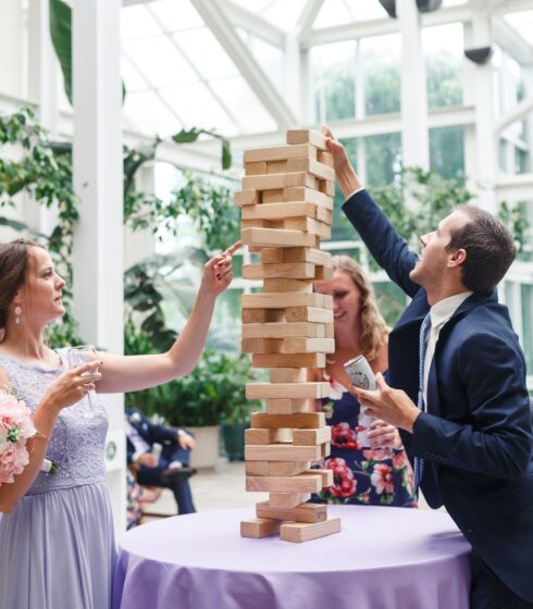 Wedding guests playing giant jenga.