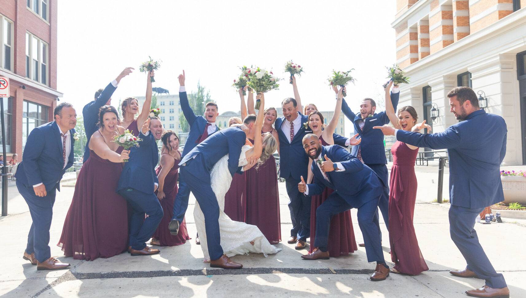 wedding party celebrating couple on wedding day