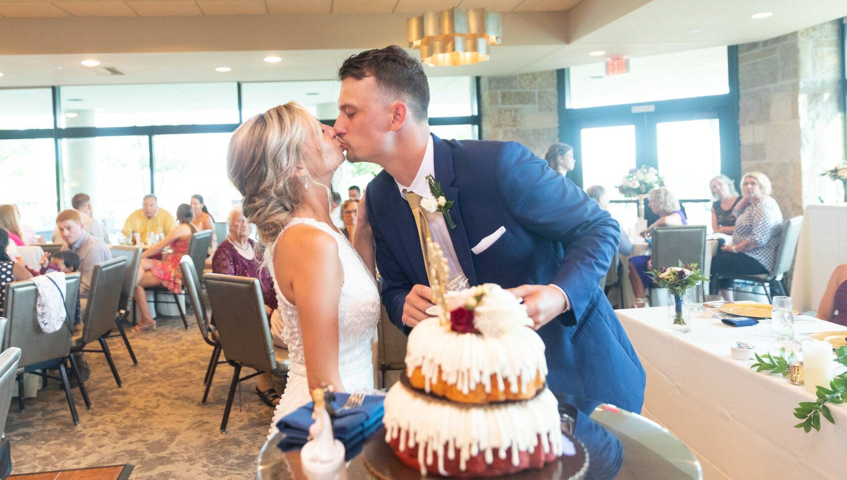 bride and groom kissing on wedding day