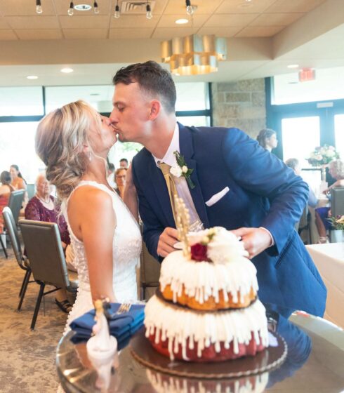 bride and groom kissing on wedding day