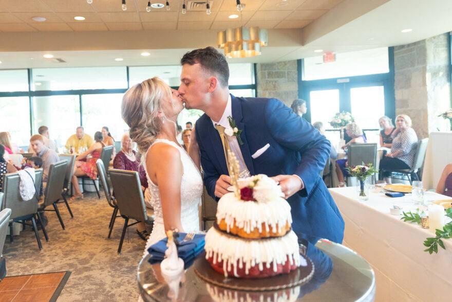 bride and groom kissing on wedding day