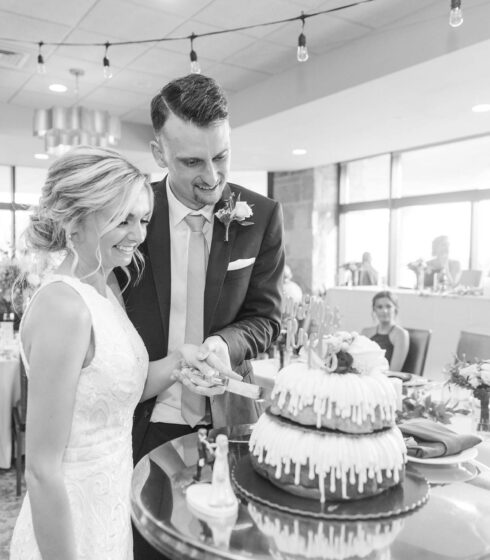 wedding couple cutting their Bundt wedding cake