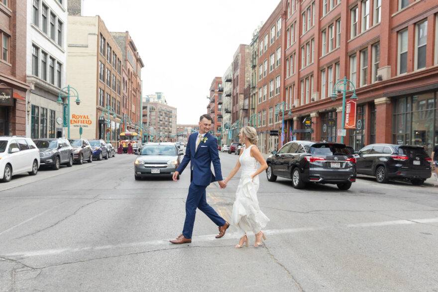 wedding couple walking down the street