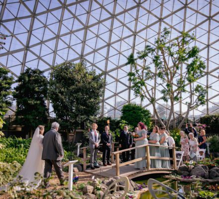 bride and her father approaching altar at milwaukee domes
