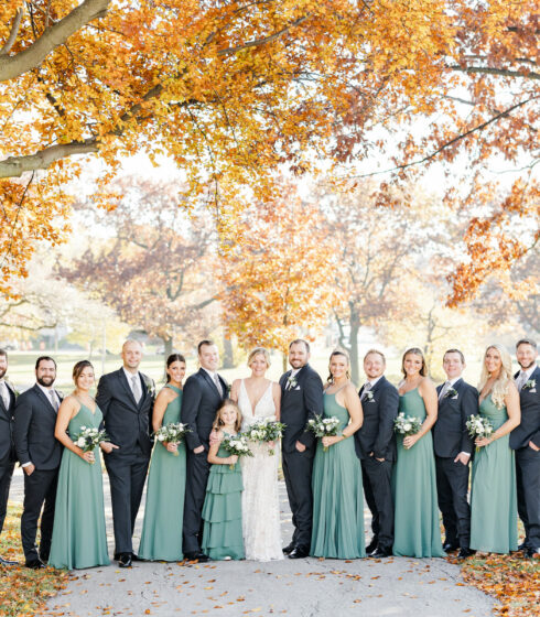 Bridal party under the fall trees.