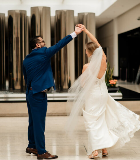 groom spinning bride