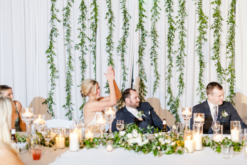 couple and bridal party at head table.