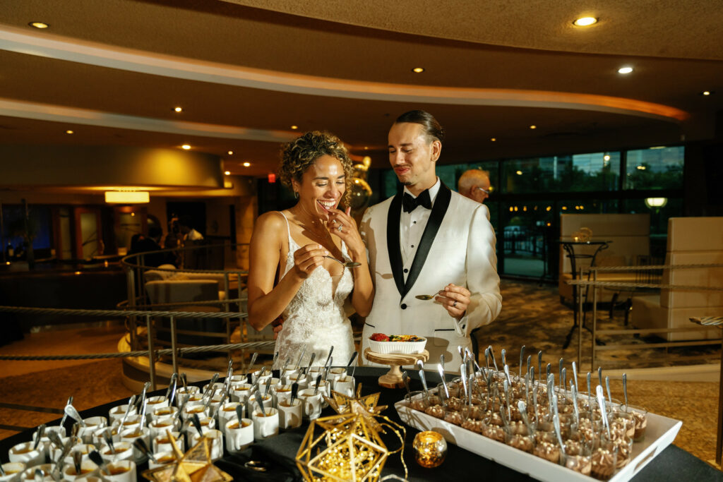 wedding couple tasting desserts