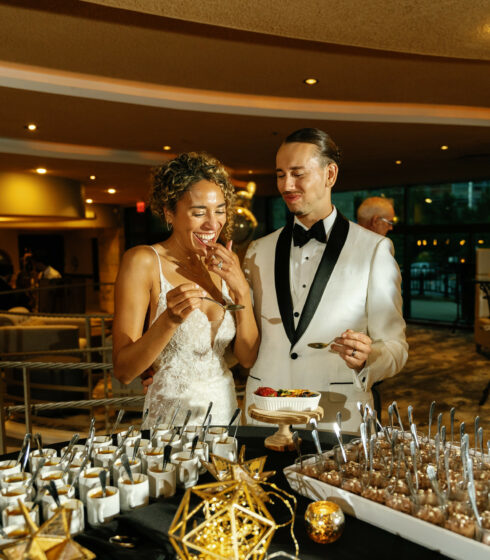 wedding couple tasting desserts