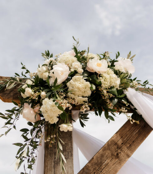 white flowers with green accents