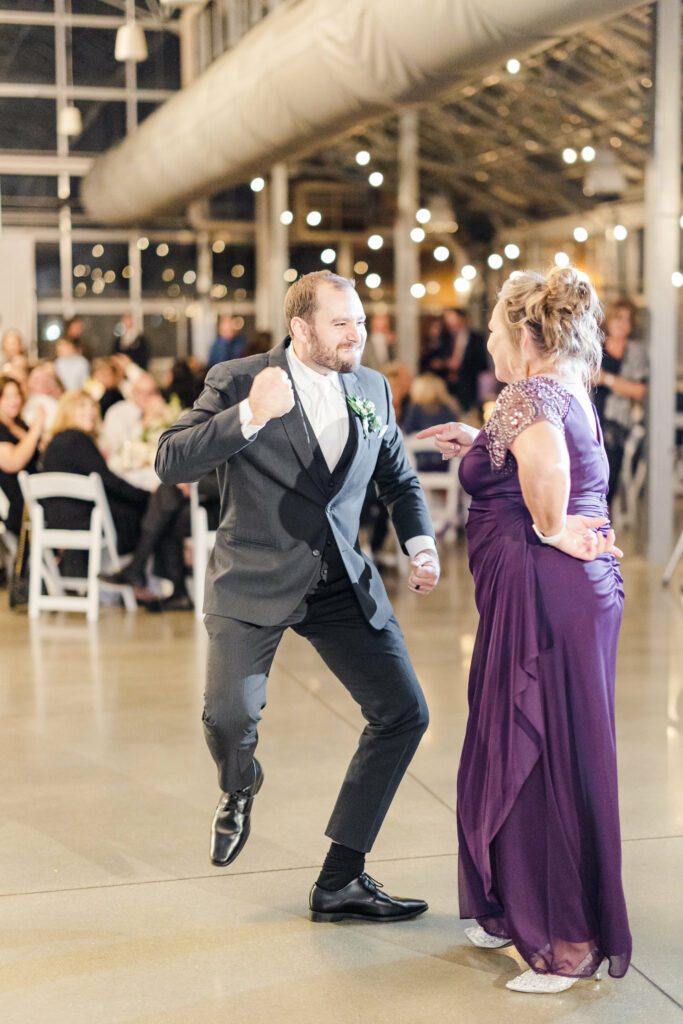 Groom dancing with his mom.