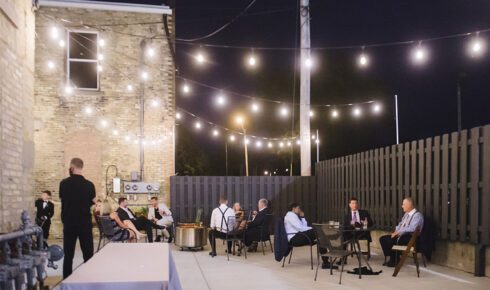 Outdoor tables with wedding guests