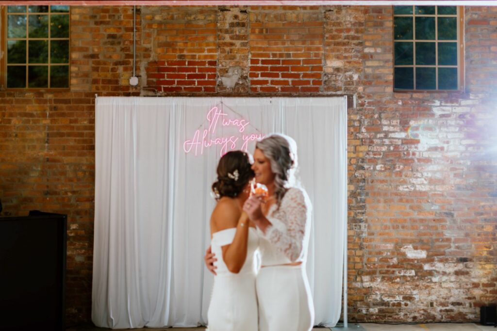 couple wedding first dance with white draping