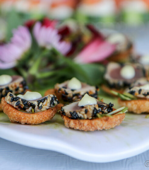 sesame ahi tuna appetizer on white tray