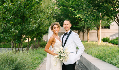 wedding couple smiling outside