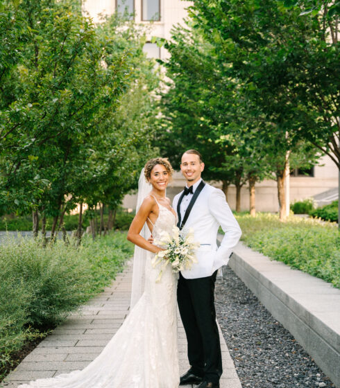 wedding couple smiling outside