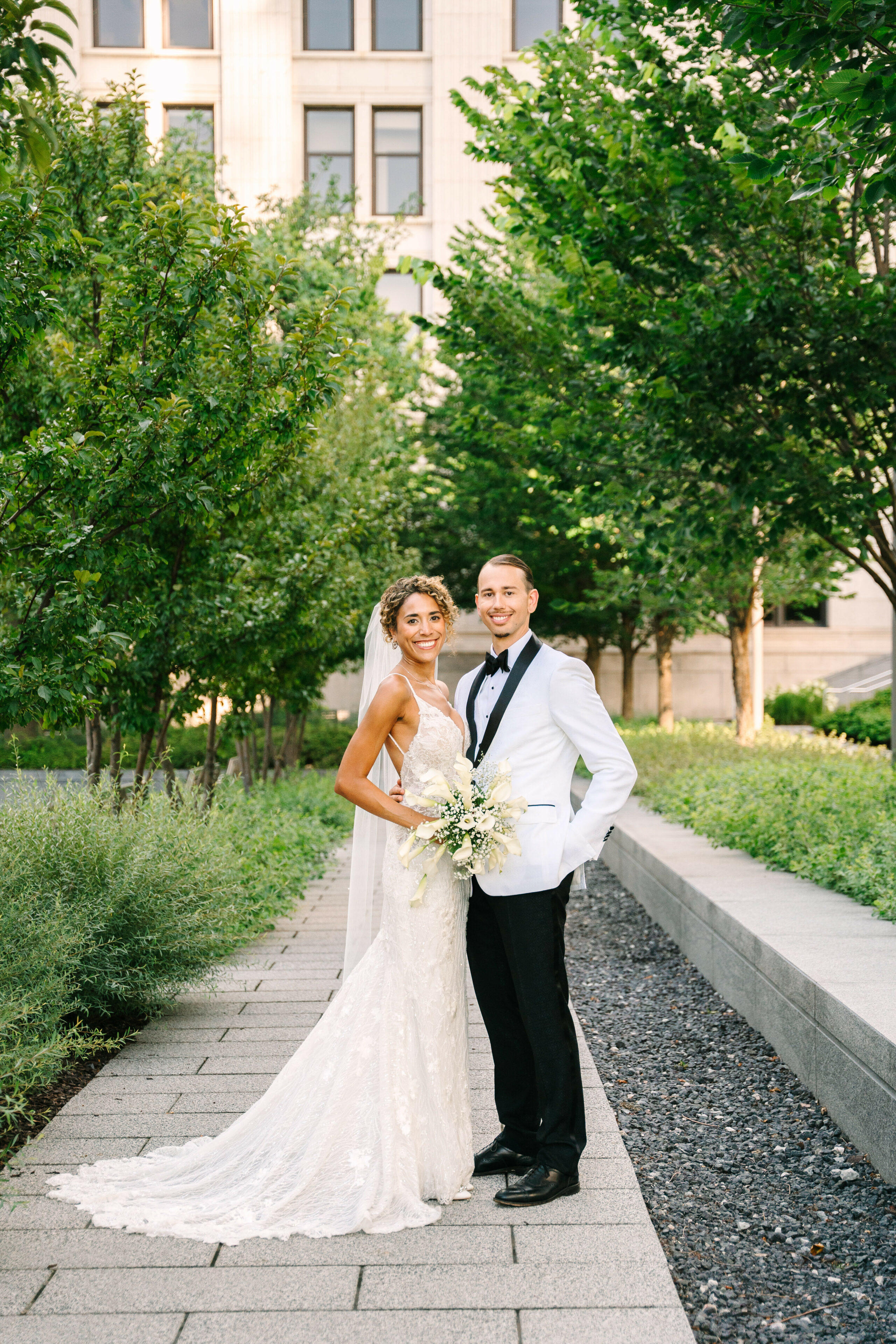 wedding couple smiling outside