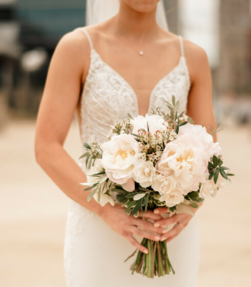 bride with white bouquet