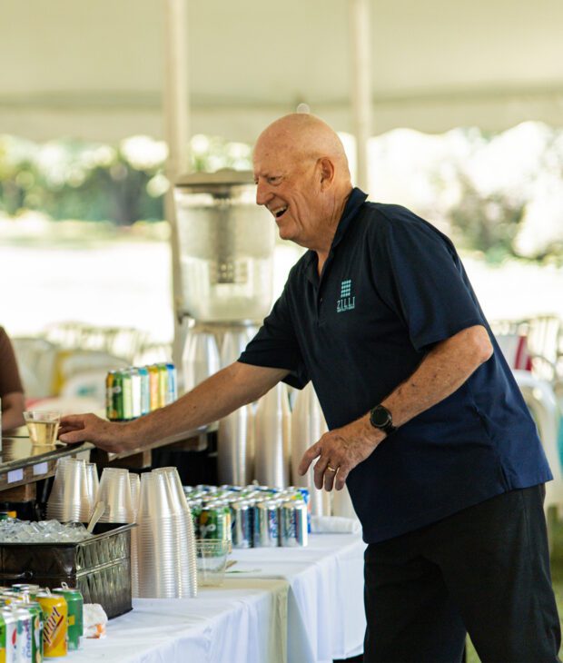 Smiling bartender at outdoor event