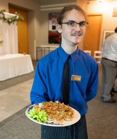 Server with tray of appetizers