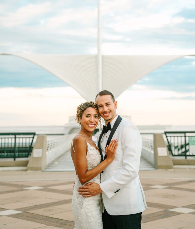 Bride and groom at Milwaukee boardwalk