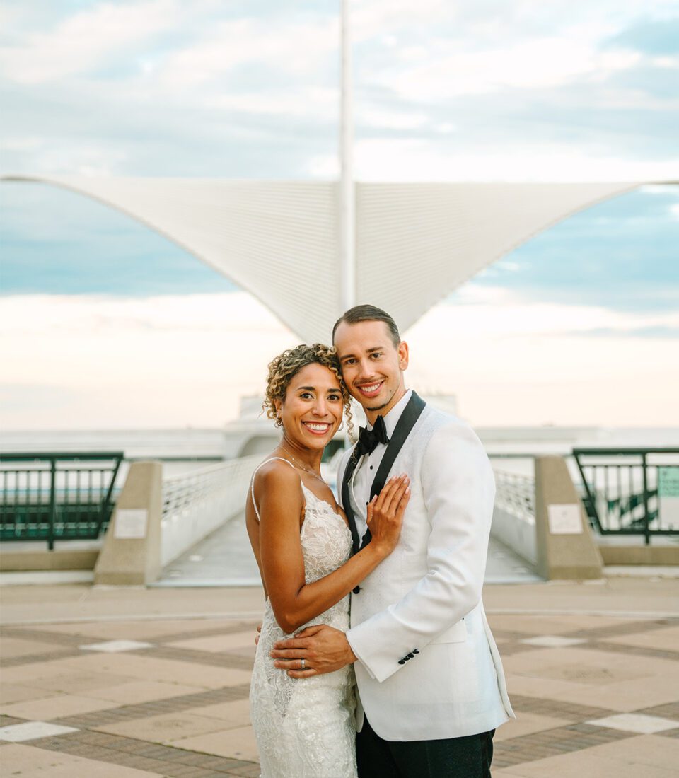 Bride and groom at Milwaukee boardwalk