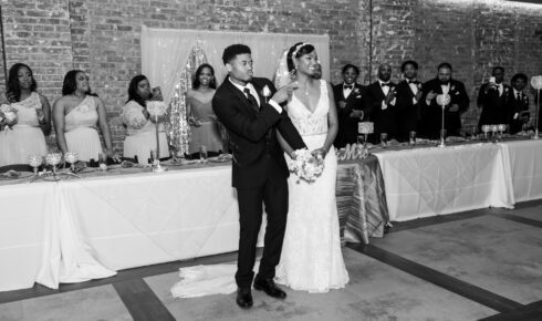 wedding couple at head table at The Gage